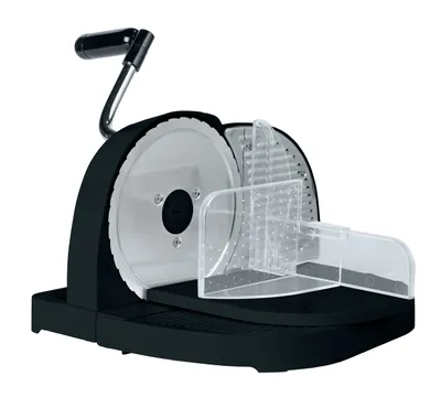 A black electric food slicer with a clear protective guard and a silver cutting blade is shown from a diagonal front view.