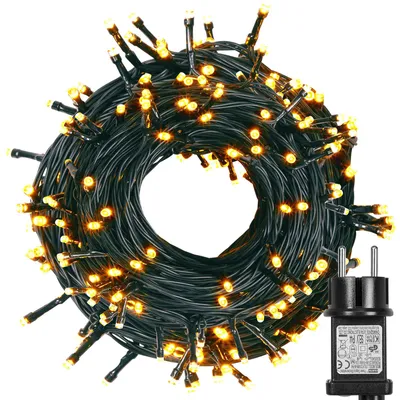 A coiled string of LED lights with a power adapter.