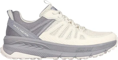 A side view of a single Skechers shoe.