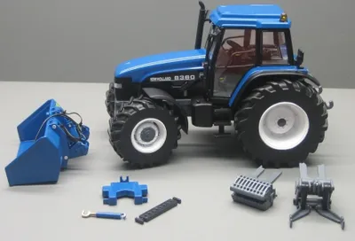 Produktbild von NEW HOLLAND 8360 mit Mulde, REP094, Maßstab1/32, REPLICAGRI