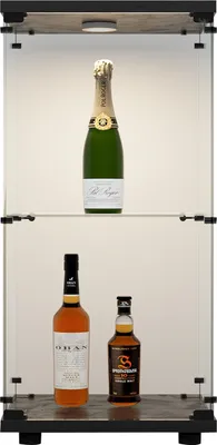 A display cabinet with bottles of alcohol on shelves.