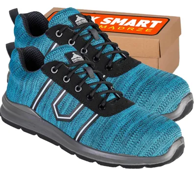 A pair of teal safety trainers with a cardboard box in the background.