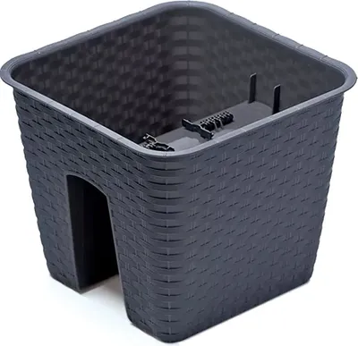 A dark gray, woven-patterned plastic planter box with an opening on one side, designed to hang on a railing or fence.