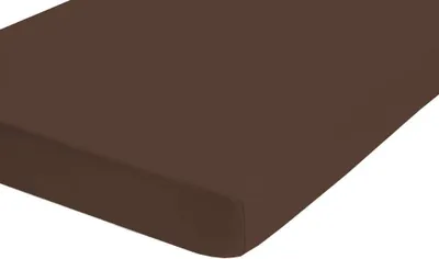 A close-up view of a brown fitted sheet.