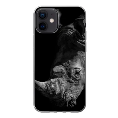 Produktbild von MuchoWow® Handyhülle Schutzhülle Hülle für iPhone 12 Nahaufnahme eines Nashorns auf schwarzem Hintergrund Silikon Softcase Handy Hülle - Schutzhülle