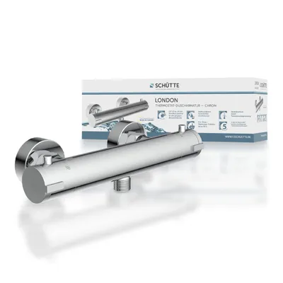 A chrome shower faucet with its packaging in the background, presented on a white surface.