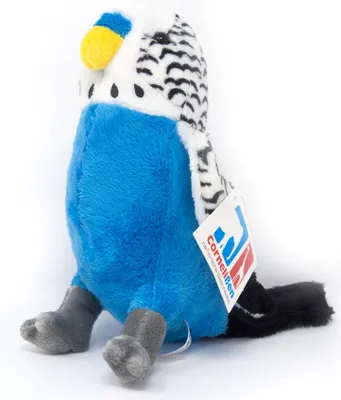 A plush toy budgie sitting on a white background.