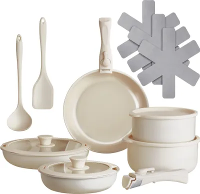 A collection of cookware and kitchen utensils arranged on a white background.