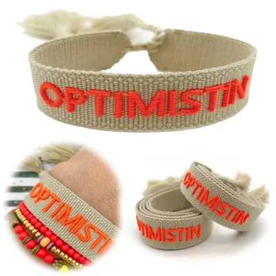 Produktbild von LS-LebenStil Canvas Statement Armband Optimistin Beige besticktes Stoffarmband gewebt textiles Quasten Spruch Boho Geschenk Freundschaftsarmband