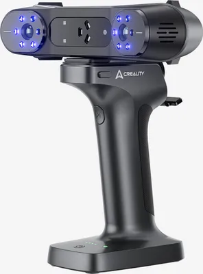 A 3D scanner on a charging stand, against a plain white background.