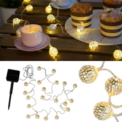 A collage showing decorative string lights with a solar panel, and a close-up of the lights with cupcakes and a teacup.