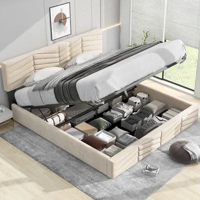 A bed with its storage compartment open, revealing organized items.