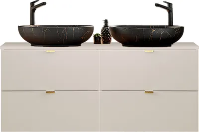 A modern bathroom vanity with two integrated sinks.