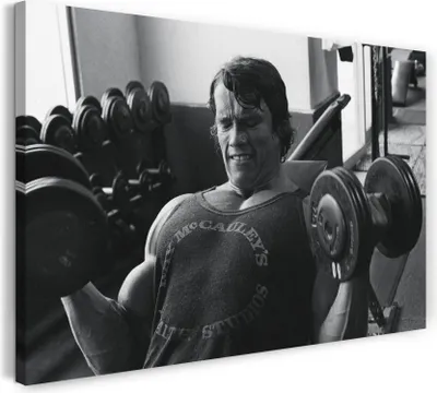 Produktbild von Leinwandbild (100x70cm): Arnold Schwarzenegger Muskel-Shirt Hanteln mit Gewichten, echter Holz-Keilrahmen inkl. Aufhänger, handgefertigt in Deutschland