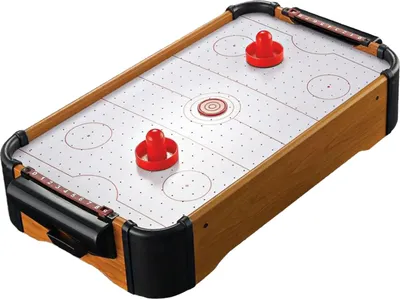 A mini air hockey table is shown from a slightly elevated angle against a white background.