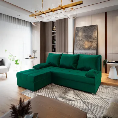A modern living room with a green sectional sofa as the main focus.