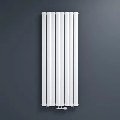 A white vertical radiator mounted on a dark gray wall.