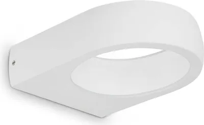 A white, modern wall lamp with a curved, teardrop-like shape, mounted on a white background.