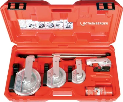 A red plastic case containing a set of pipe bending tools.