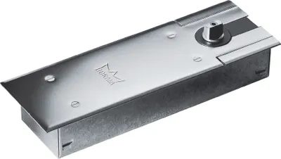 A product shot of a floor door closer on a white background.