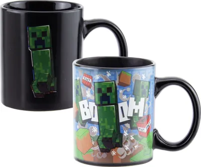 Two Minecraft Creeper mugs, one black and one colorful, are shown against a white background.
