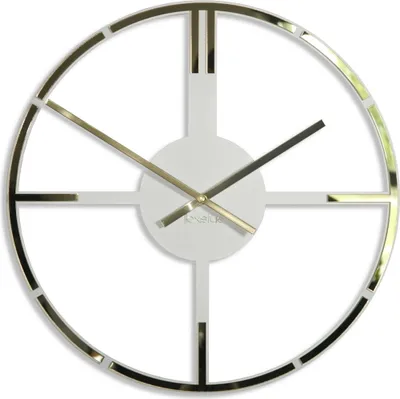 A modern, minimalist wall clock with a gold-colored metal frame and white face.
