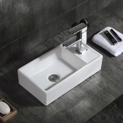 Obrázek produktu pro KERAMICKÉ OBDÉLNÍKOVÉ UMYVADLO NA DESCE BÍLÉ LESKLÉ 40x22 CM Rebiko