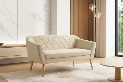 A beige sofa with diamond quilting and wooden legs is placed in a modern living room with a marble wall and wooden paneling.
