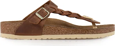 A side view of a single Birkenstock sandal.