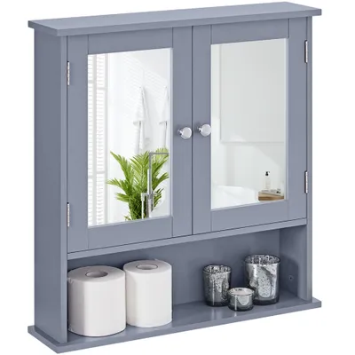 A gray bathroom cabinet with mirrored doors and a shelf below, displaying toilet paper rolls and decorative jars.