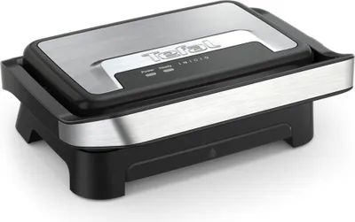 A studio shot of a black and silver Tefal panini grill.