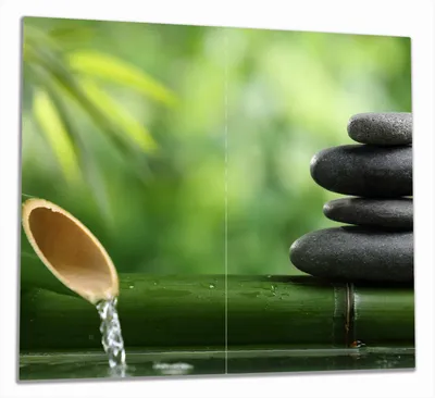 Produktbild von Wallario Herdabdeckplatte aus Glas, Größe 60 x 52 cm 2-teilig, Motiv Steinstapel und Bambus auf dem Wasser