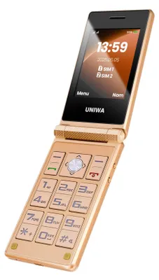 A gold flip phone is shown at an angle against a white background.
