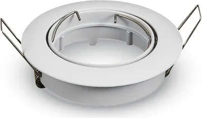 A white recessed spotlight housing with spring clips, shown from a slightly elevated angle against a white background.