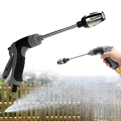 Two high-pressure washing guns are shown against a white background, with a blurred background of a fence and water spray in the lower part of the image.