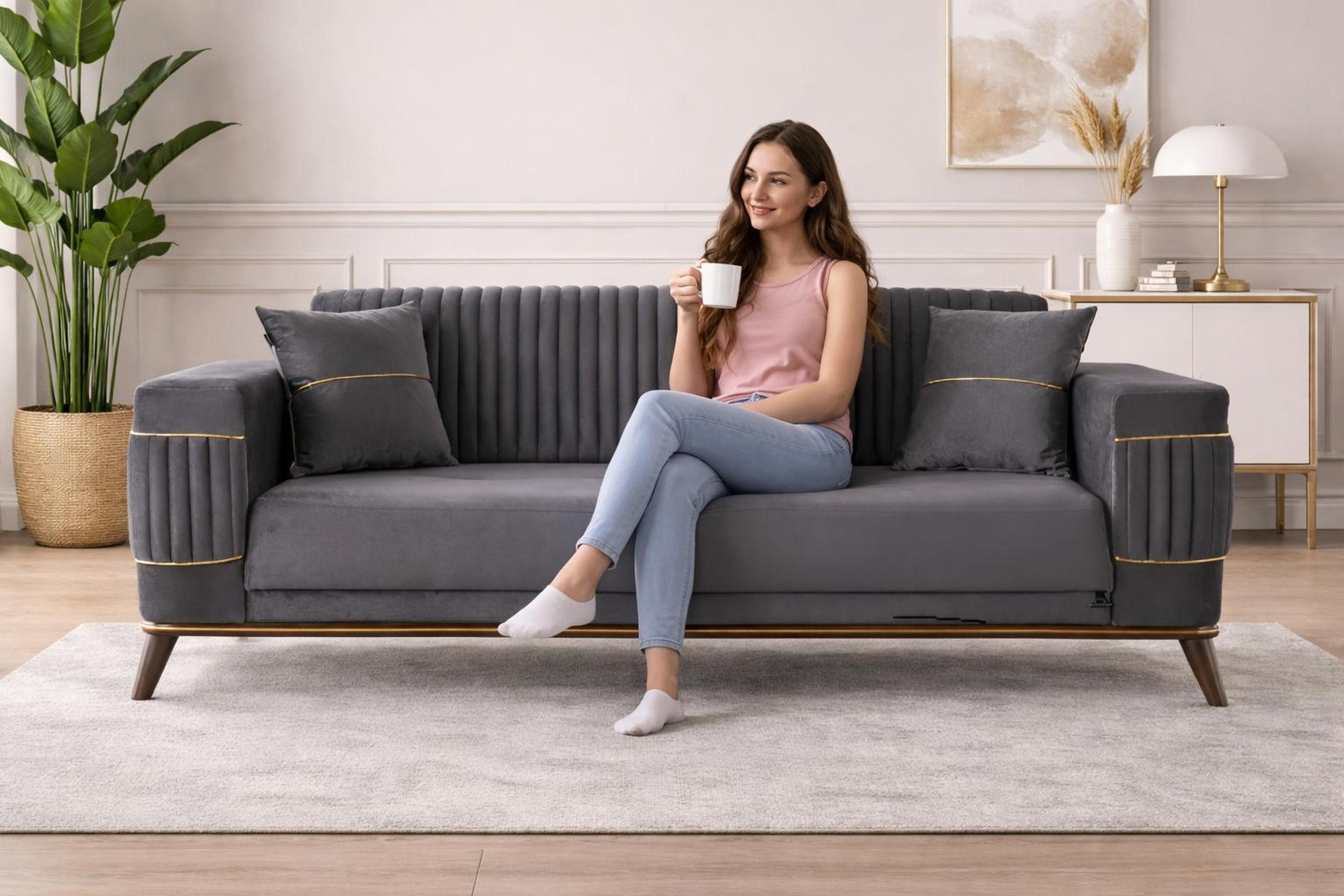 AEA s Sofa in Grau mit feinen Goldverzierungen hochwertige Möbel