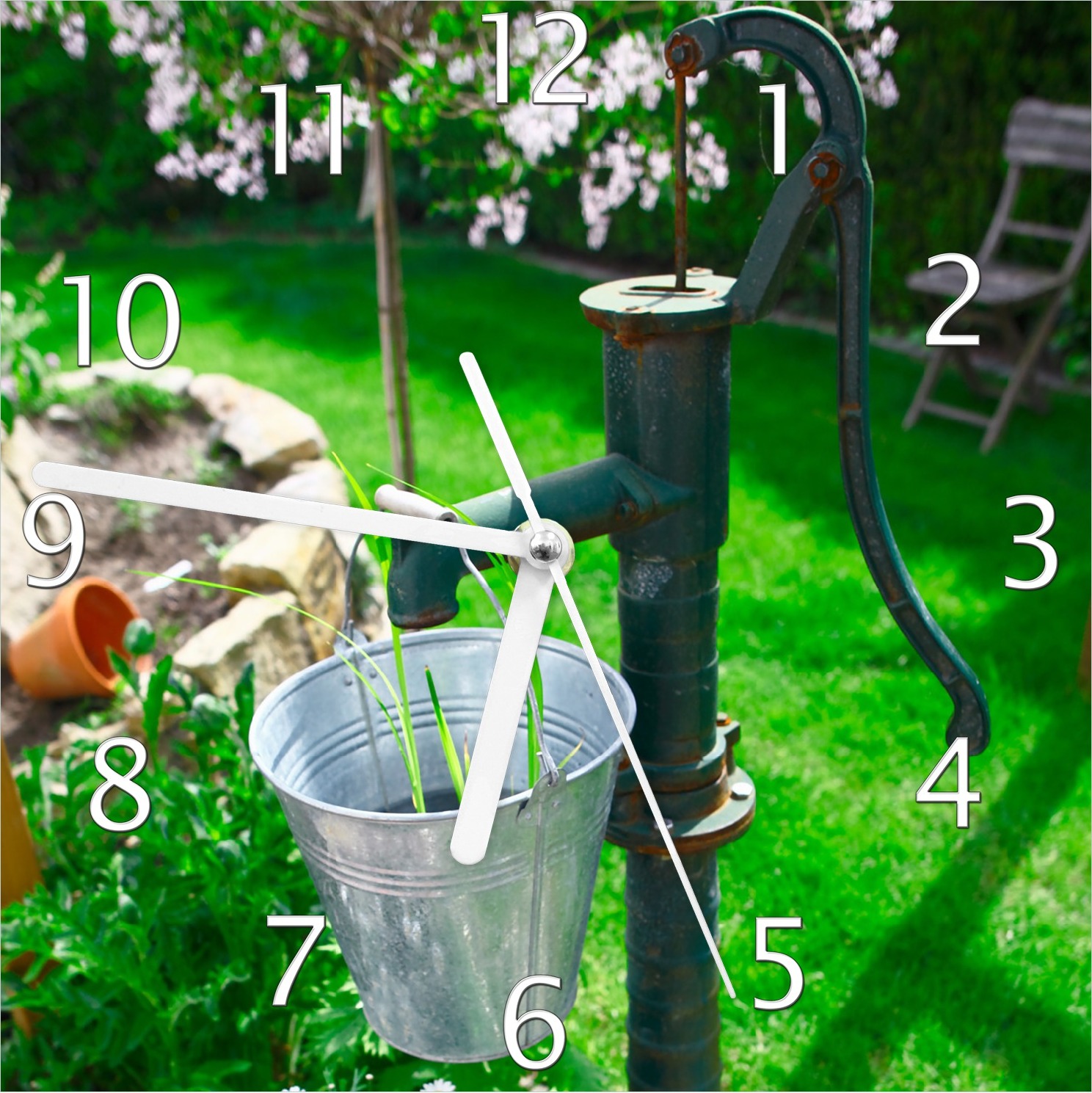 Wallario Design Wanduhr Wasserquelle im Garten aus Echtglas, Größe 20 x 20 cm guk0200-2020
