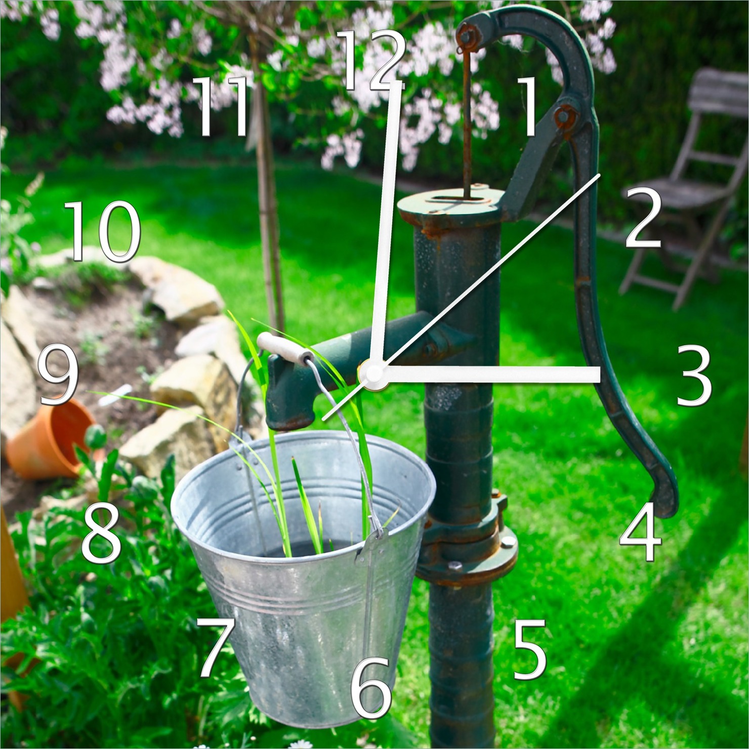 Wallario Design Wanduhr Wasserquelle im Garten aus Echtglas, Größe 30 x 30 cm guk0200-3030