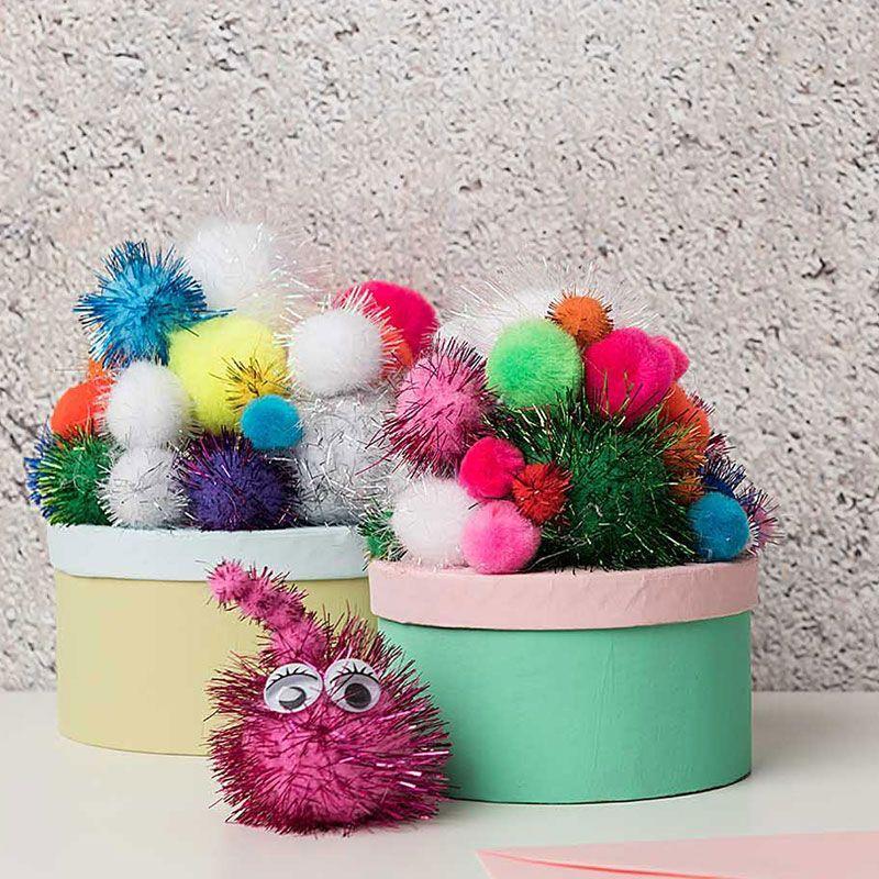 Rico Design 60 Glitzerpompons aus Wolle - Mehrfarbig 6068