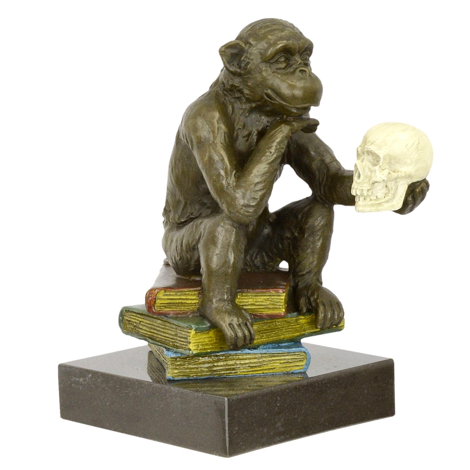 Bronzefigur Affe Darwin Philosophie Bücher