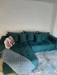 Grünes Sofa