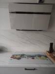 Cache plaque de cuisson 
