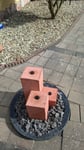 Betonfarbe für einen Steinbrunnen