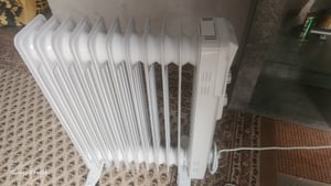 Clatronic Ölradiator | Effiziente mobile Heizung | elektrische Heizung mit 11 Rippen | 3 Stufen | Slimline Heizkörper | bis zu 50qm | 2300 W | RA 3737 Kunden-Foto 1