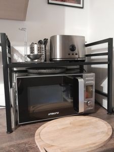Küchenregale, Ausziehbarer Mikrowellenständer mit 6 Haken, 40-64cm ausziehbarer Mikrowellen Regal, Gewürzregal, Mikrowellenhalterung, Organizer mit 6 Haken, bis 30kg, Schwarz Kunden-Foto 7