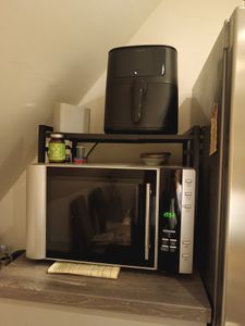 Küchenregale, Ausziehbarer Mikrowellenständer mit 6 Haken, 40-64cm ausziehbarer Mikrowellen Regal, Gewürzregal, Mikrowellenhalterung, Organizer mit 6 Haken, bis 30kg, Schwarz Kunden-Foto 11