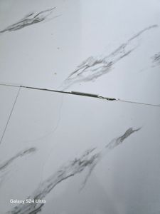 Click-Vinyl CHECK One 2160 Glehner Marmor Hochglanz-Fliese XL inkl. Trittschall Standard - 1m² Kunden-Foto 1