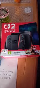 Nintendo Switch 2-Konsolen + Mario Kart World Kunden-Foto 5