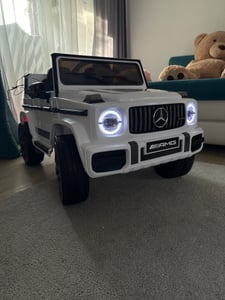 Mercedes G63 4x4 AMG 12V-9ah, 4 Motoren, Leder Sitz, EVA Räder Kinderfahrzeug Kinderauto Kinder Elektroauto Kunden-Foto 1