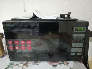 Kuchenka mikrofalowa czarna 20 L 800 W 6 programów automatycznych 5 poziomów Sharp R242BKW Zdjęcie produktu od klienta nr 1